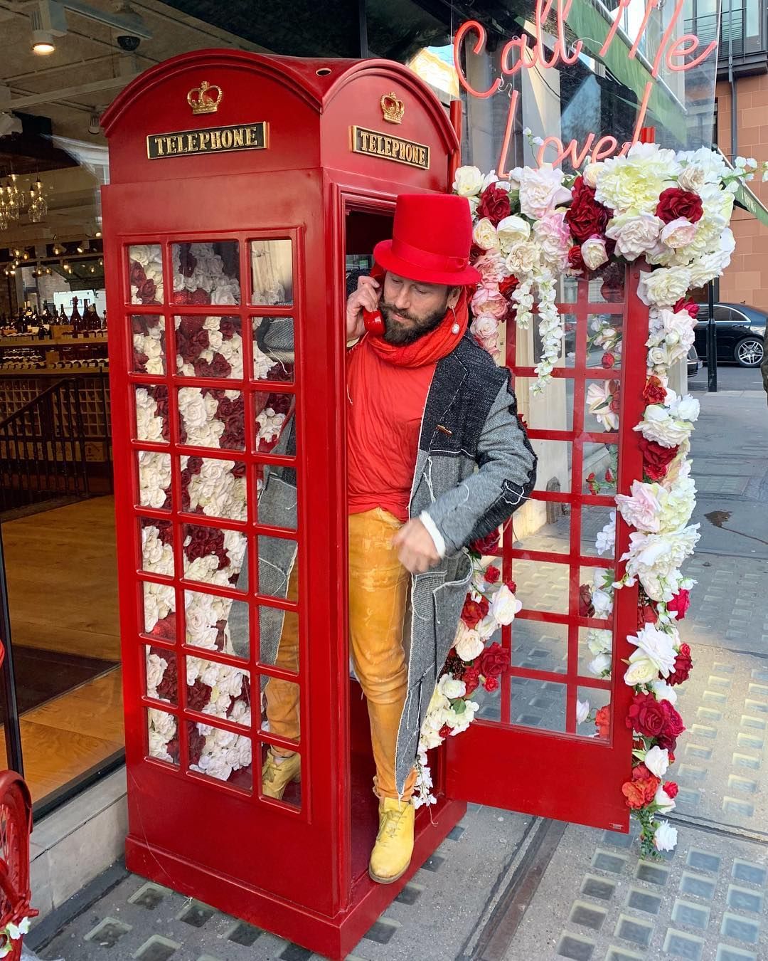 Hire a traditional looking phone box filled with flowers.