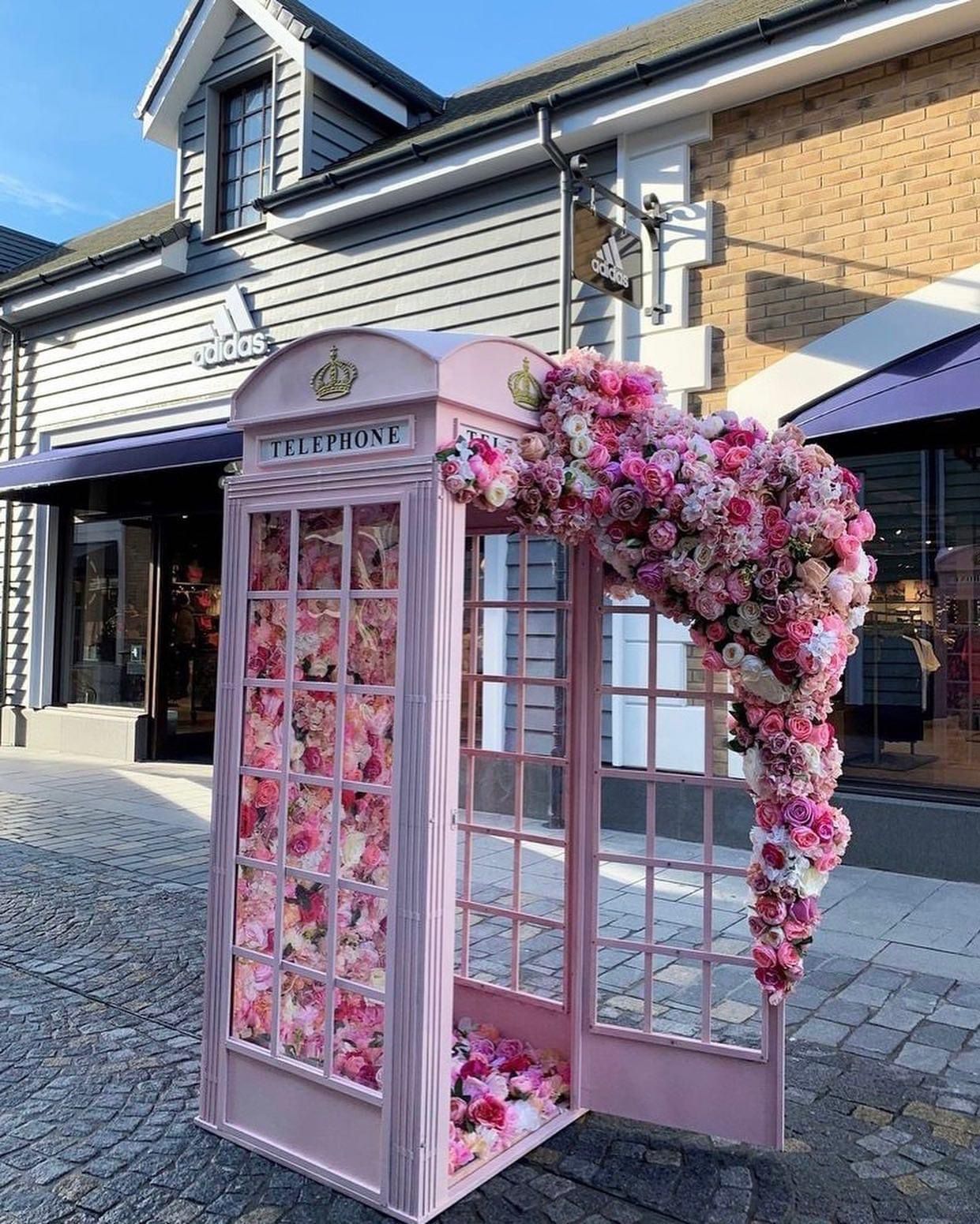 Pink telephone box for hire